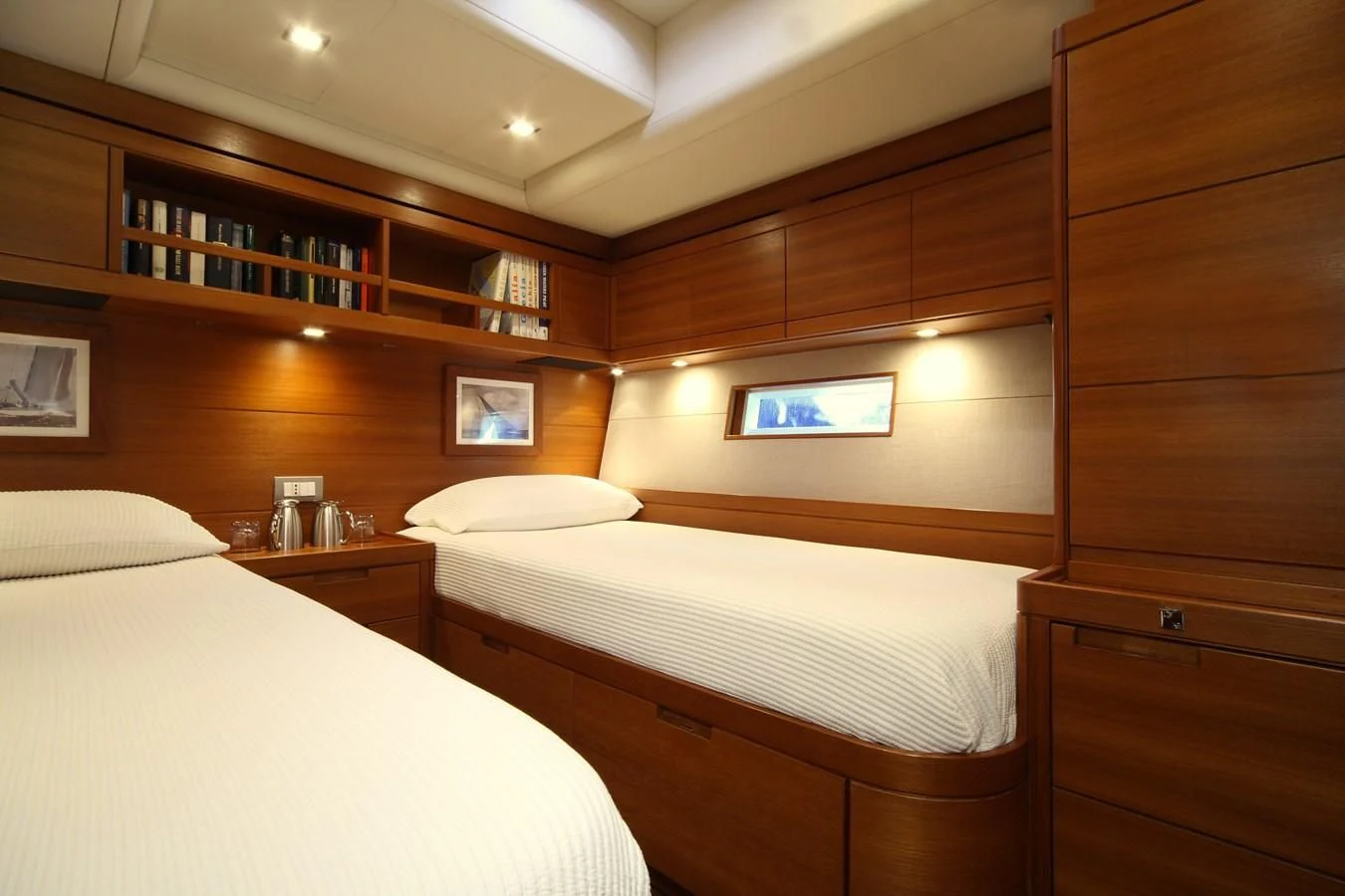 a room with two beds aboard ACAIA Yacht for Sale