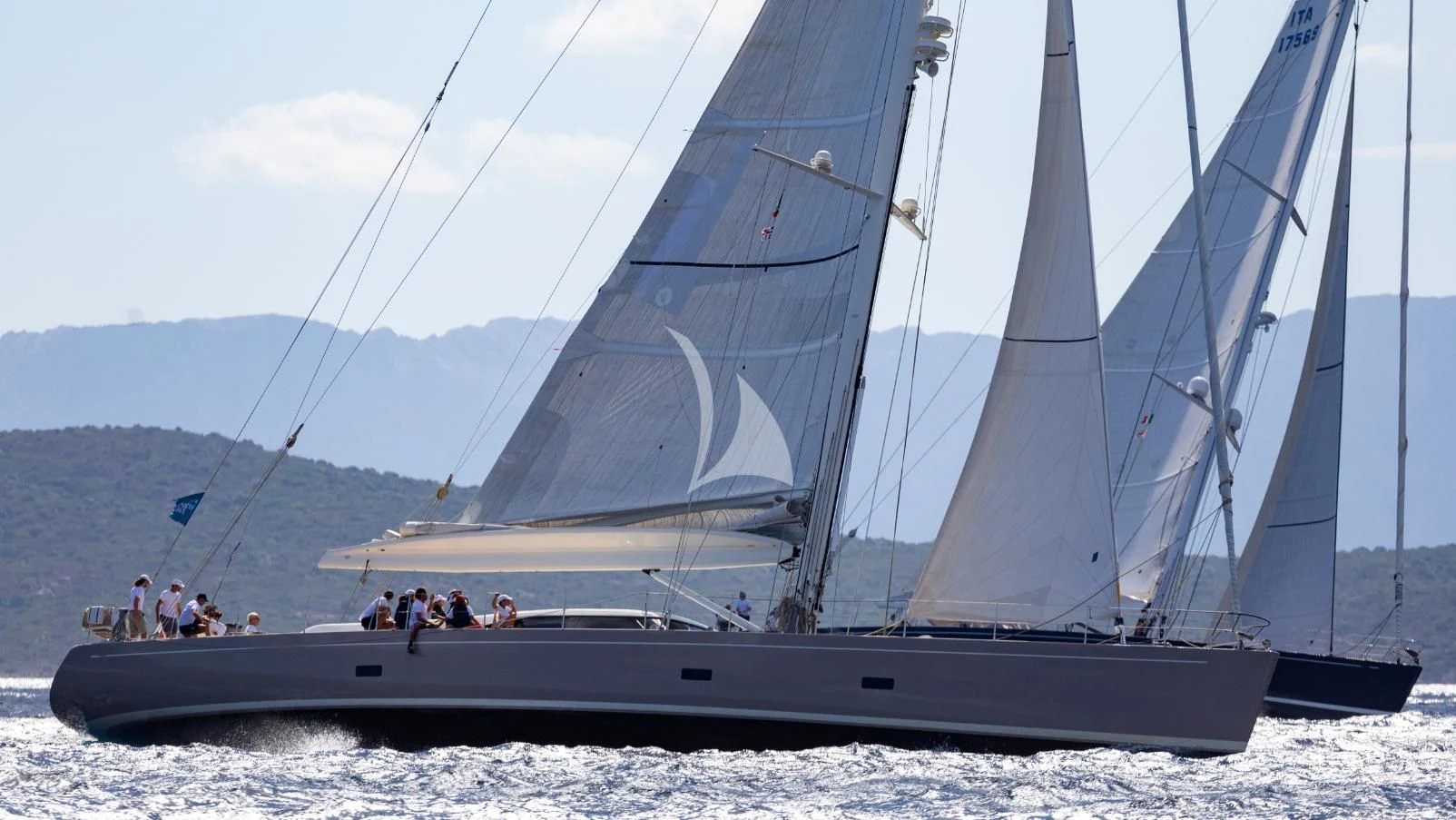 a boat on the beach aboard ACAIA Yacht for Sale
