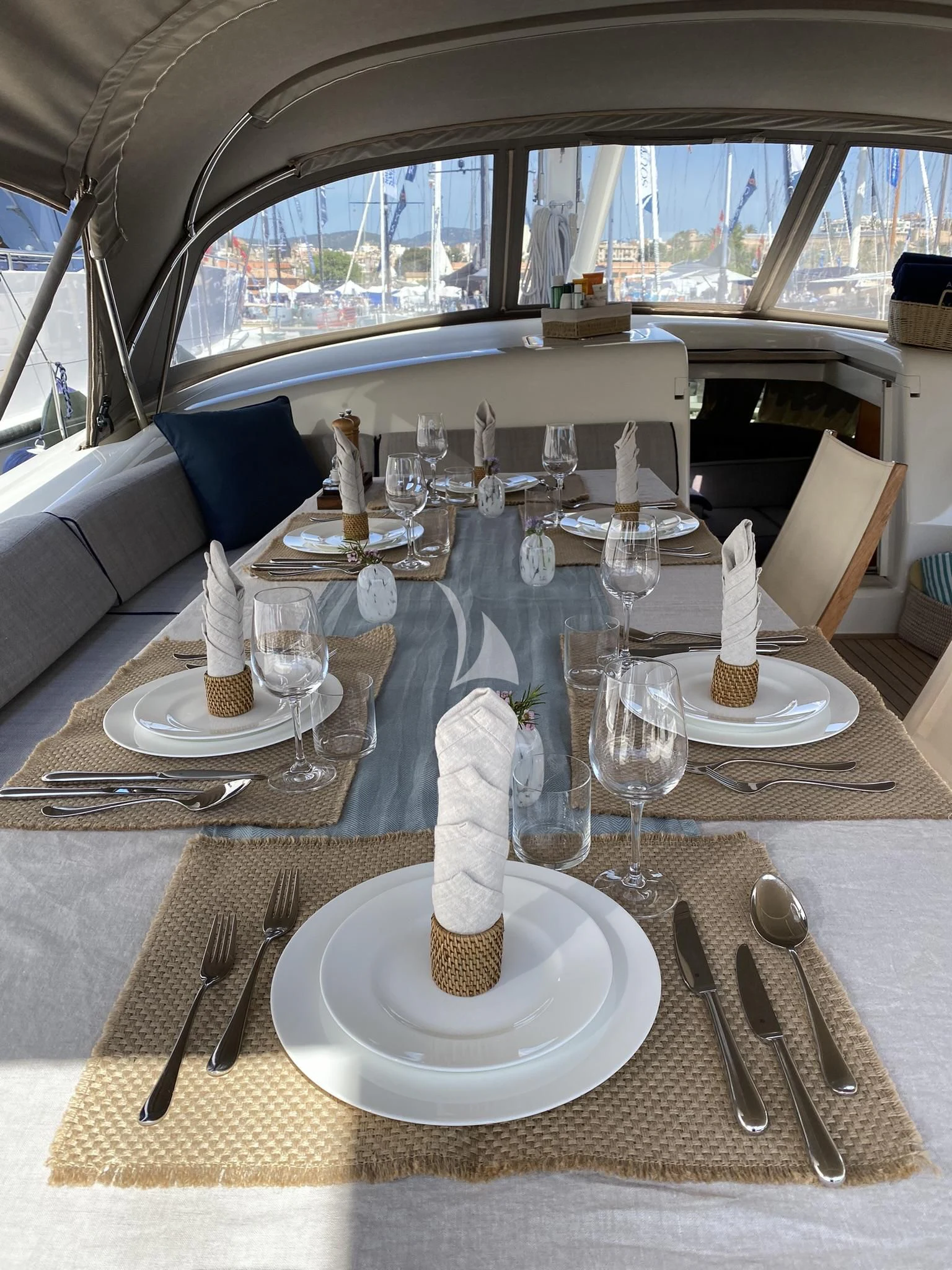 a table set with silverware and silverware aboard ACAIA Yacht for Sale