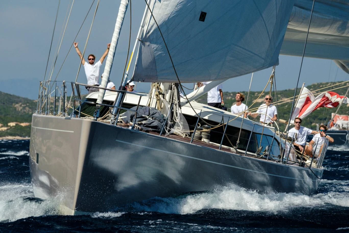 a group of people on a boat aboard ACAIA Yacht for Sale