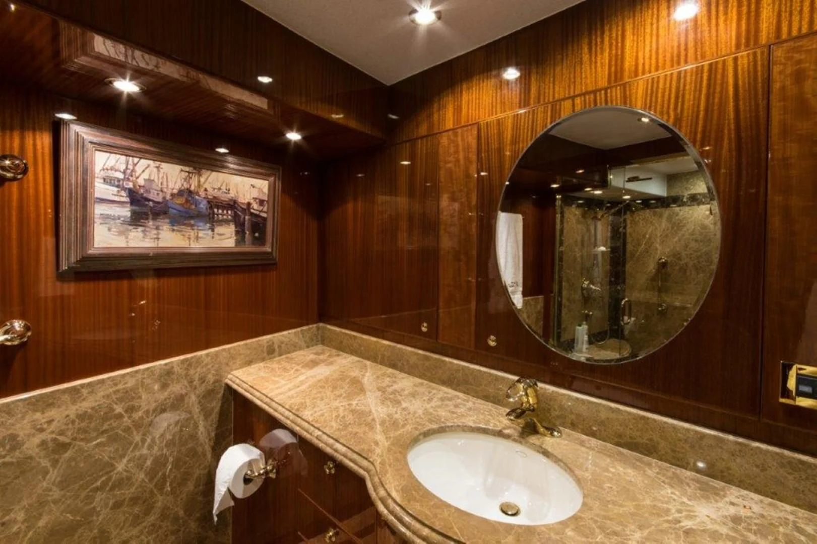 a bathroom with a large mirror aboard DUNIA Yacht for Sale
