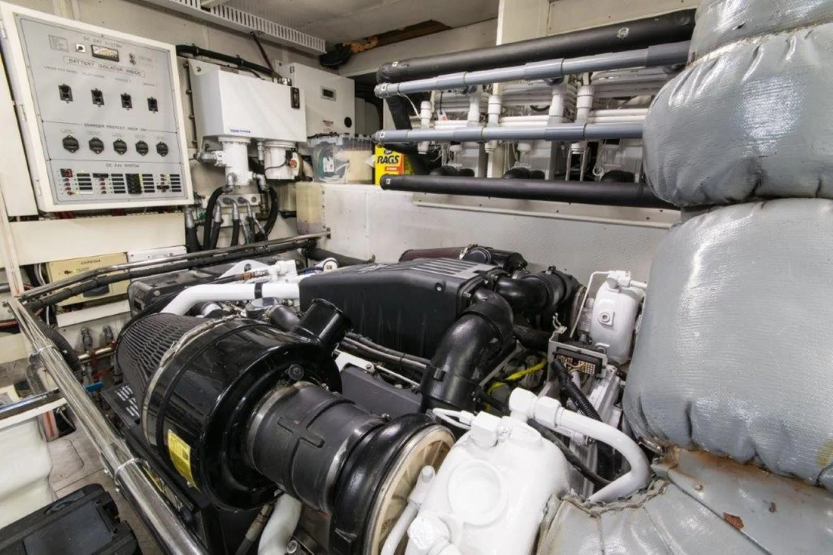 a car with a large engine aboard DUNIA Yacht for Sale
