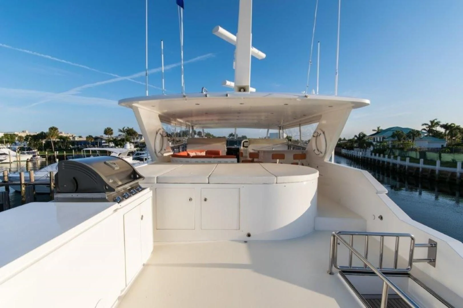 a large white building with a white roof and a white tower aboard DUNIA Yacht for Sale