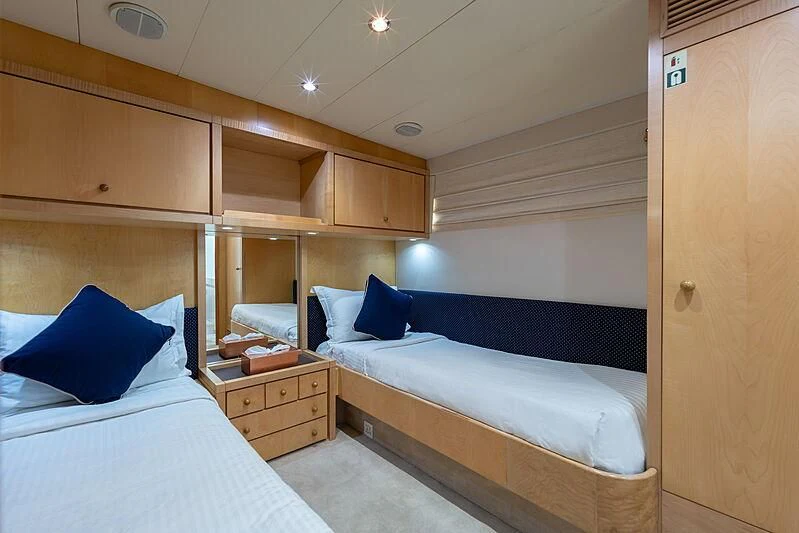 a room with two beds aboard AJAO Yacht for Sale