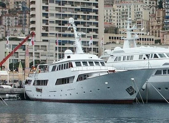 a large white boat in the water aboard MONTECRISTO Yacht for Sale