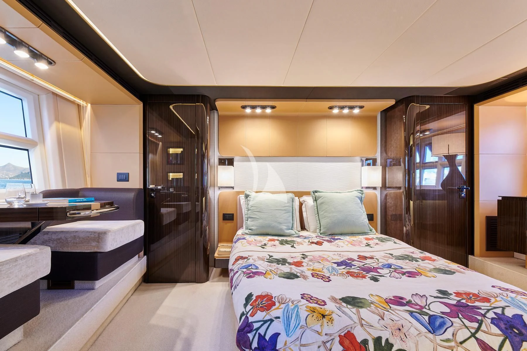 a room with a bed and a desk aboard ALKYONE Yacht for Sale