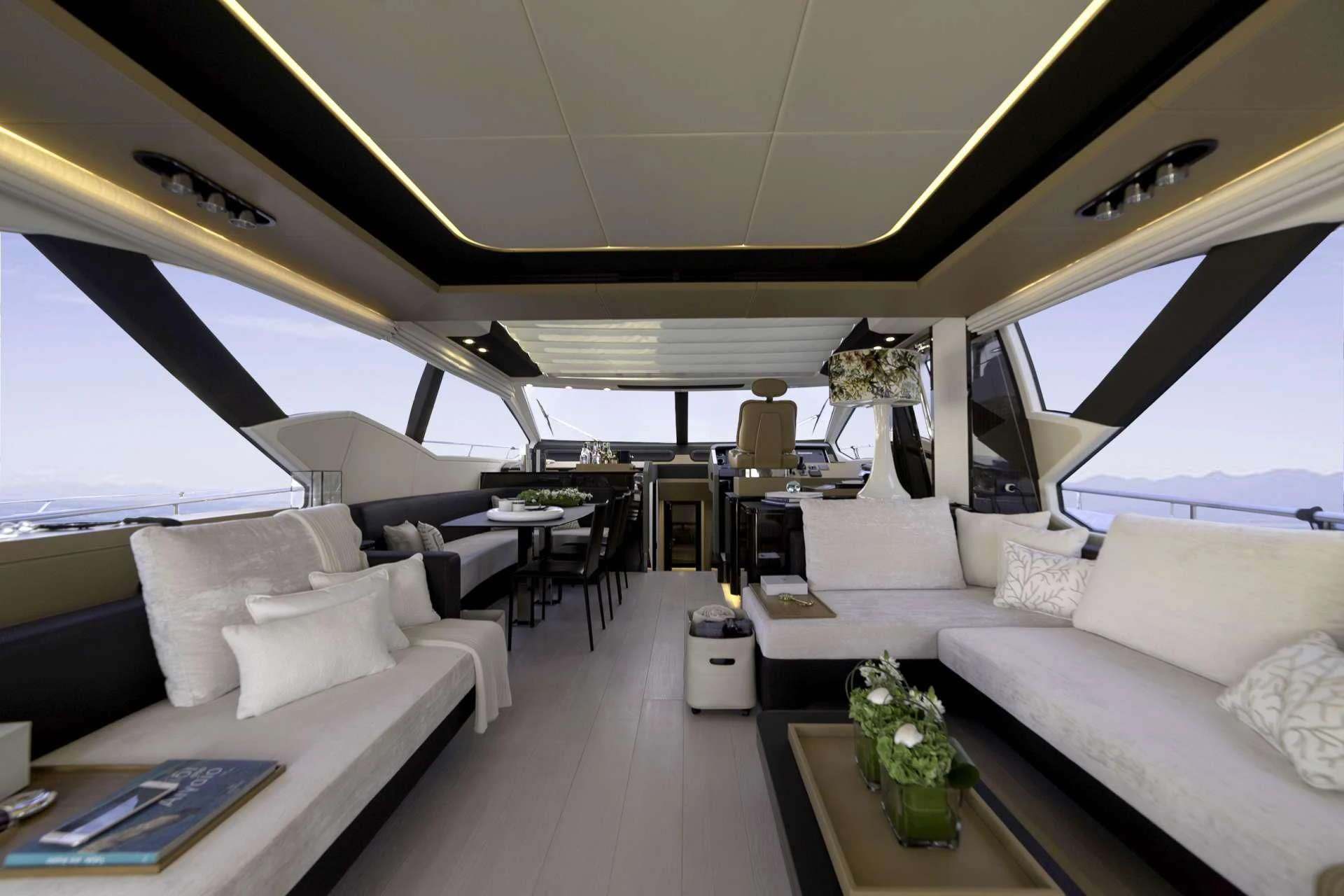 a large living room with a large window aboard ALKYONE Yacht for Sale