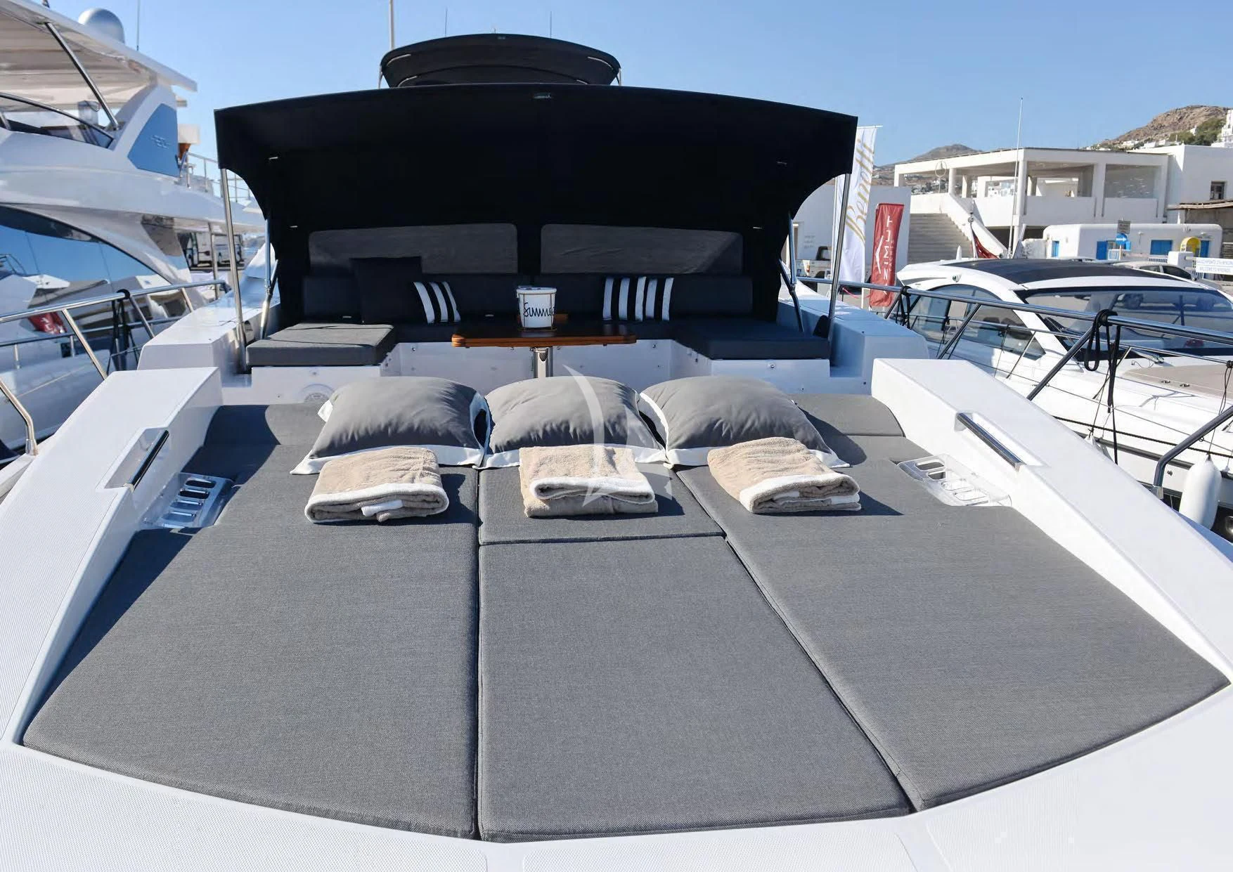 a black and silver boat on a trailer aboard ALKYONE Yacht for Sale