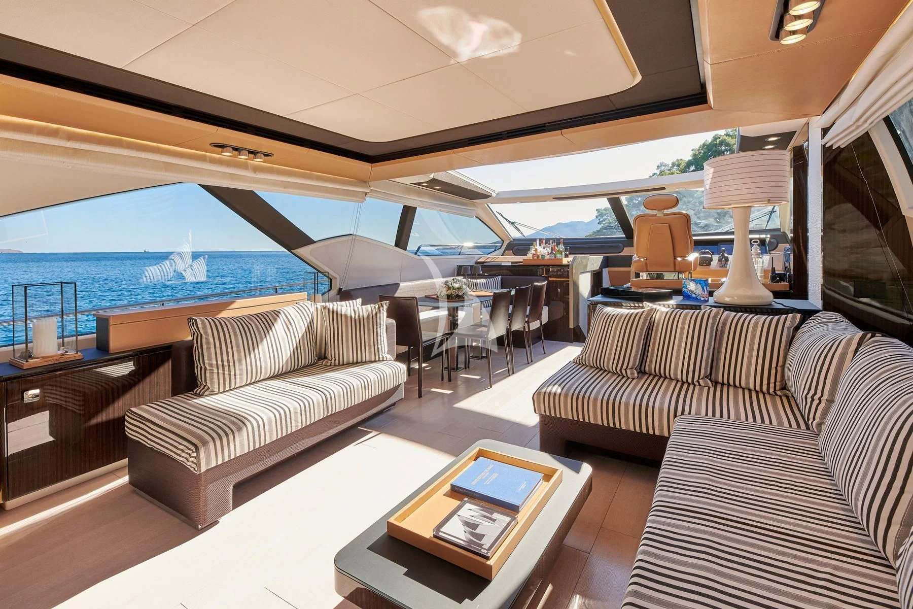 a living room with a large window aboard ALKYONE Yacht for Sale