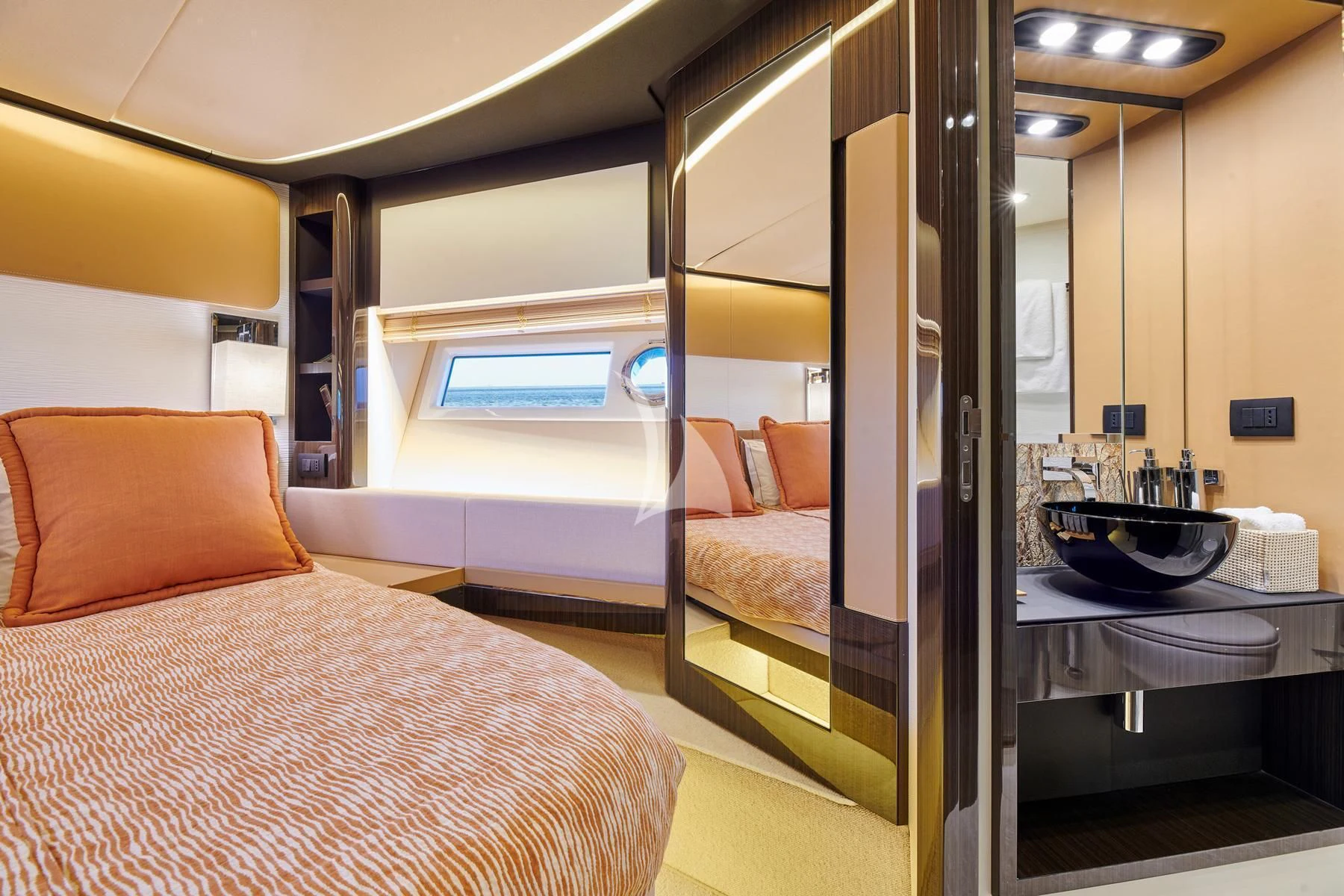 a hotel room with a bed and a table aboard ALKYONE Yacht for Sale