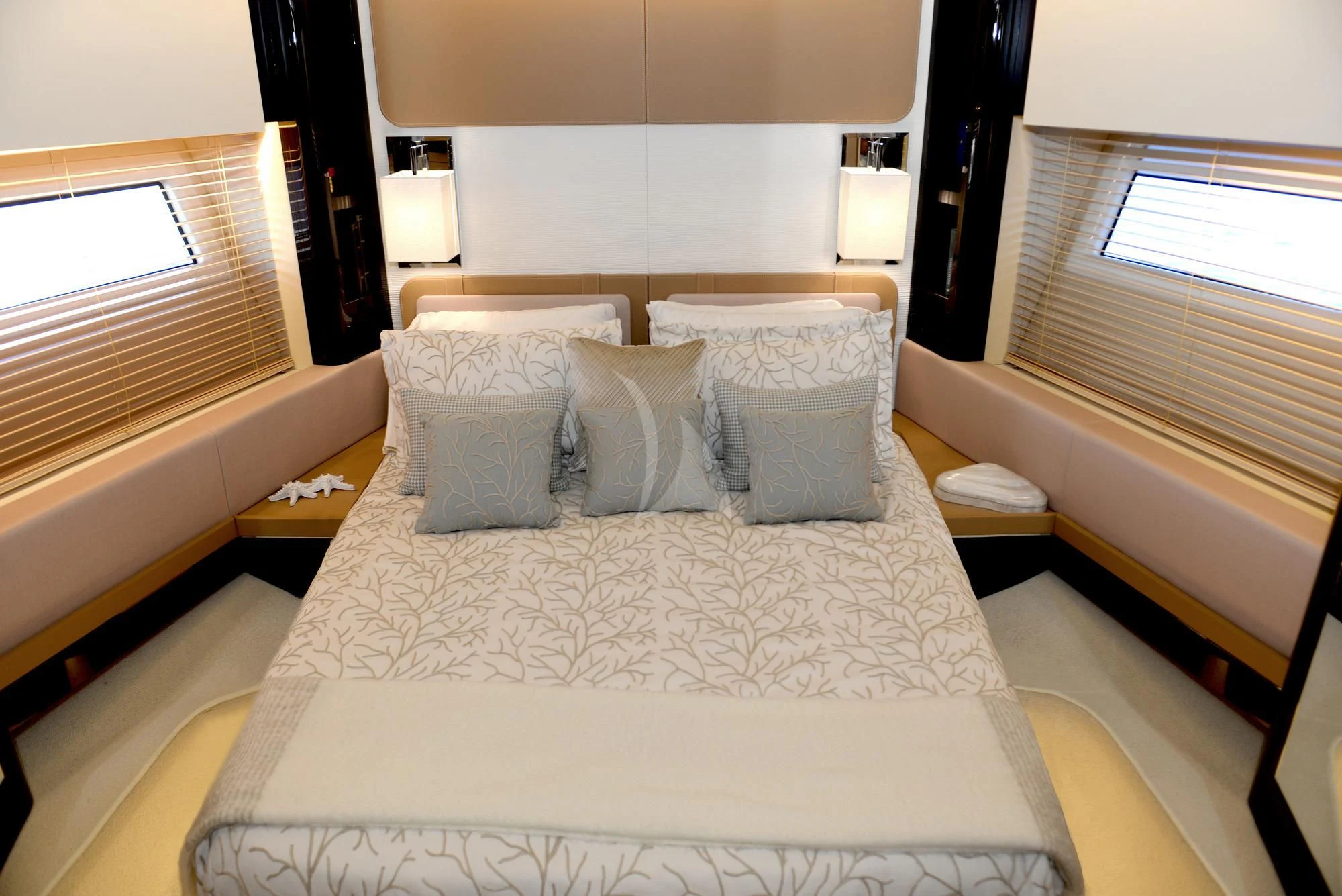 a bed with white sheets aboard ALKYONE Yacht for Sale