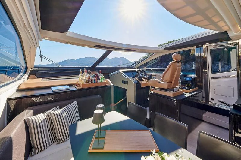 a person sitting in a boat aboard ALKYONE Yacht for Sale