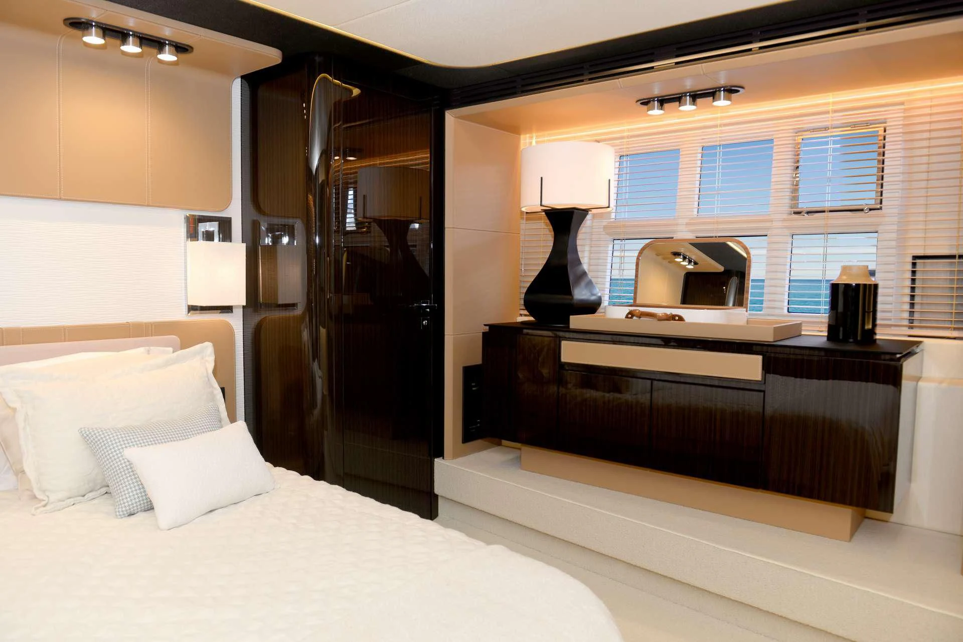 a room with a bed and a desk aboard ALKYONE Yacht for Sale