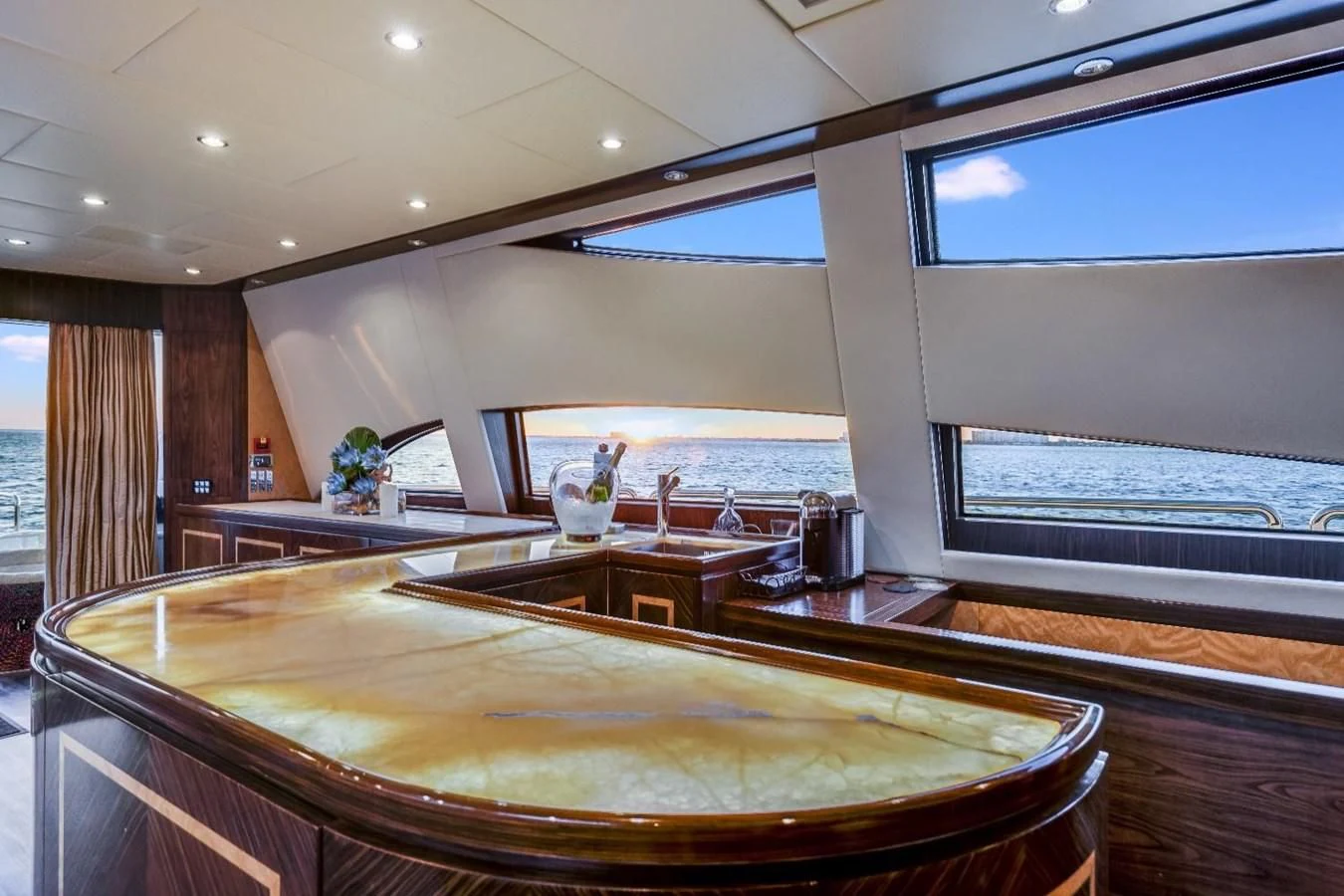 a large kitchen with a large table aboard LEOPARD Yacht for Sale