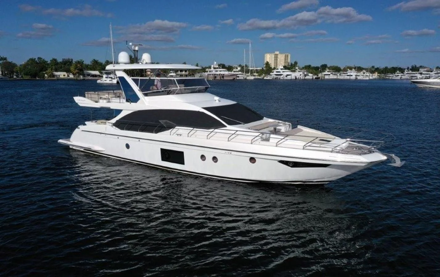 a white yacht on the water aboard LEVATAR Yacht for Sale