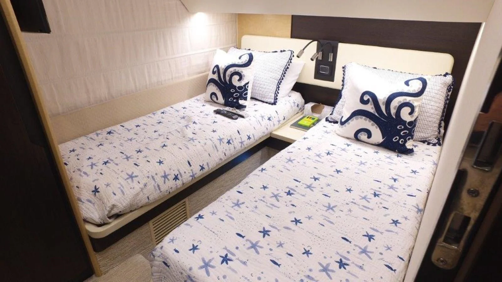 a couple of beds in a room aboard LEVATAR Yacht for Sale