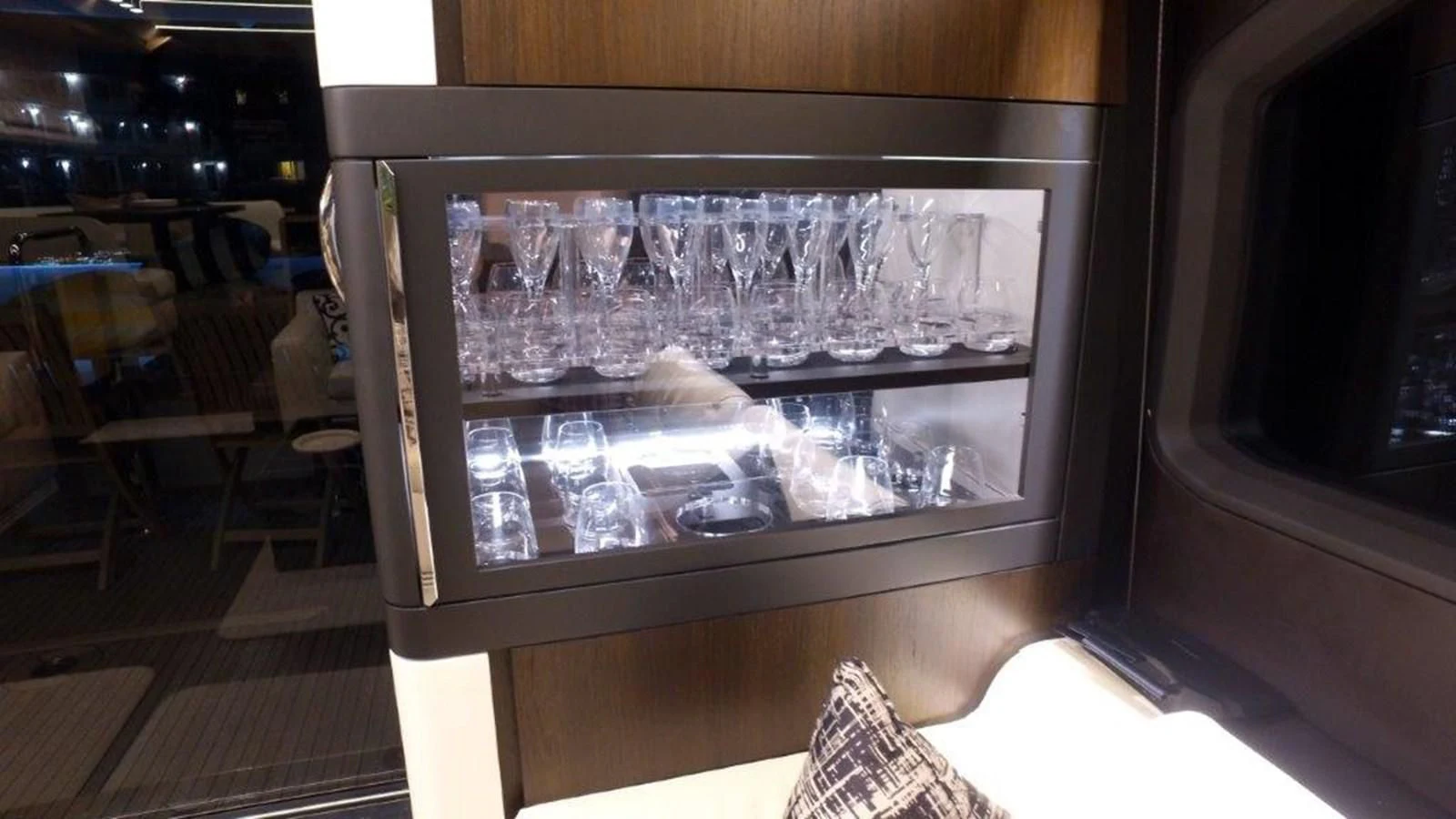 a glass case with a glass display aboard LEVATAR Yacht for Sale