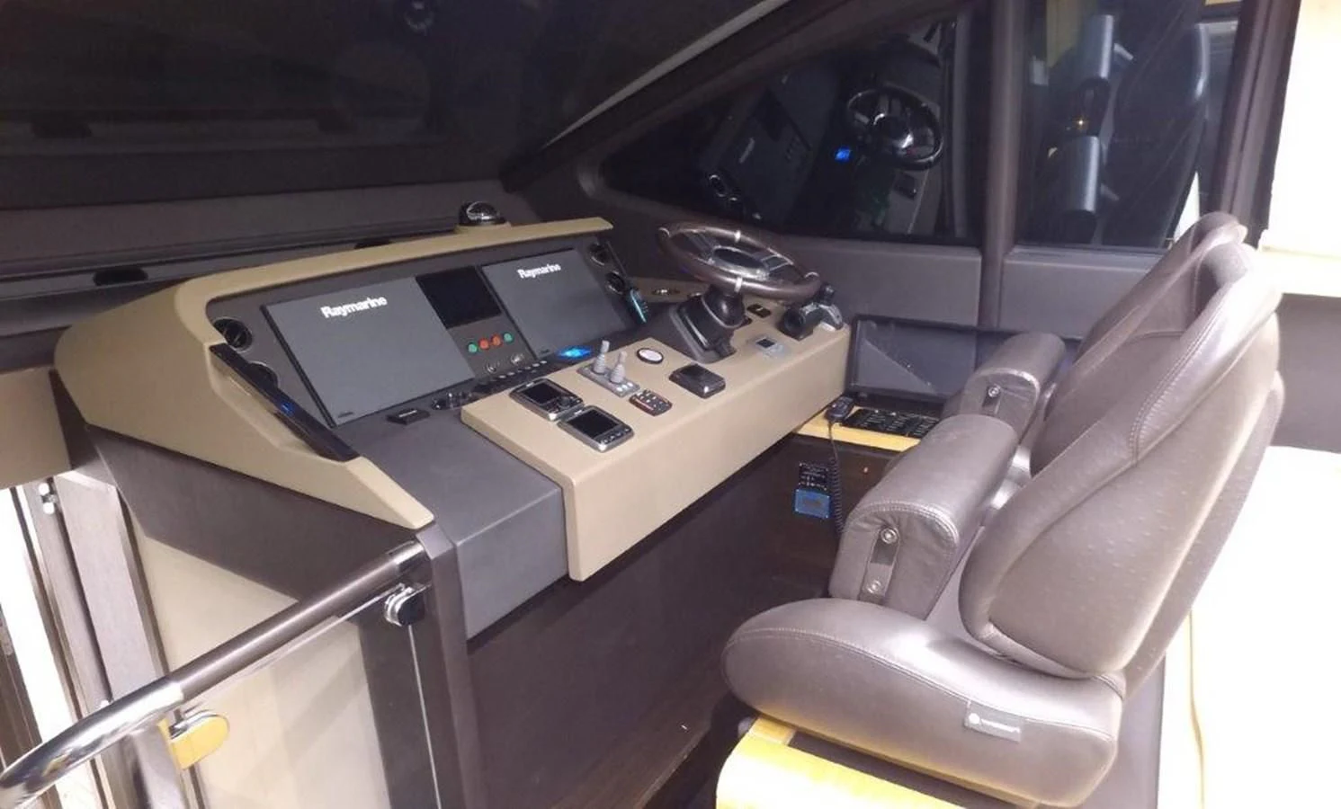 a room with a desk and a chair aboard LEVATAR Yacht for Sale