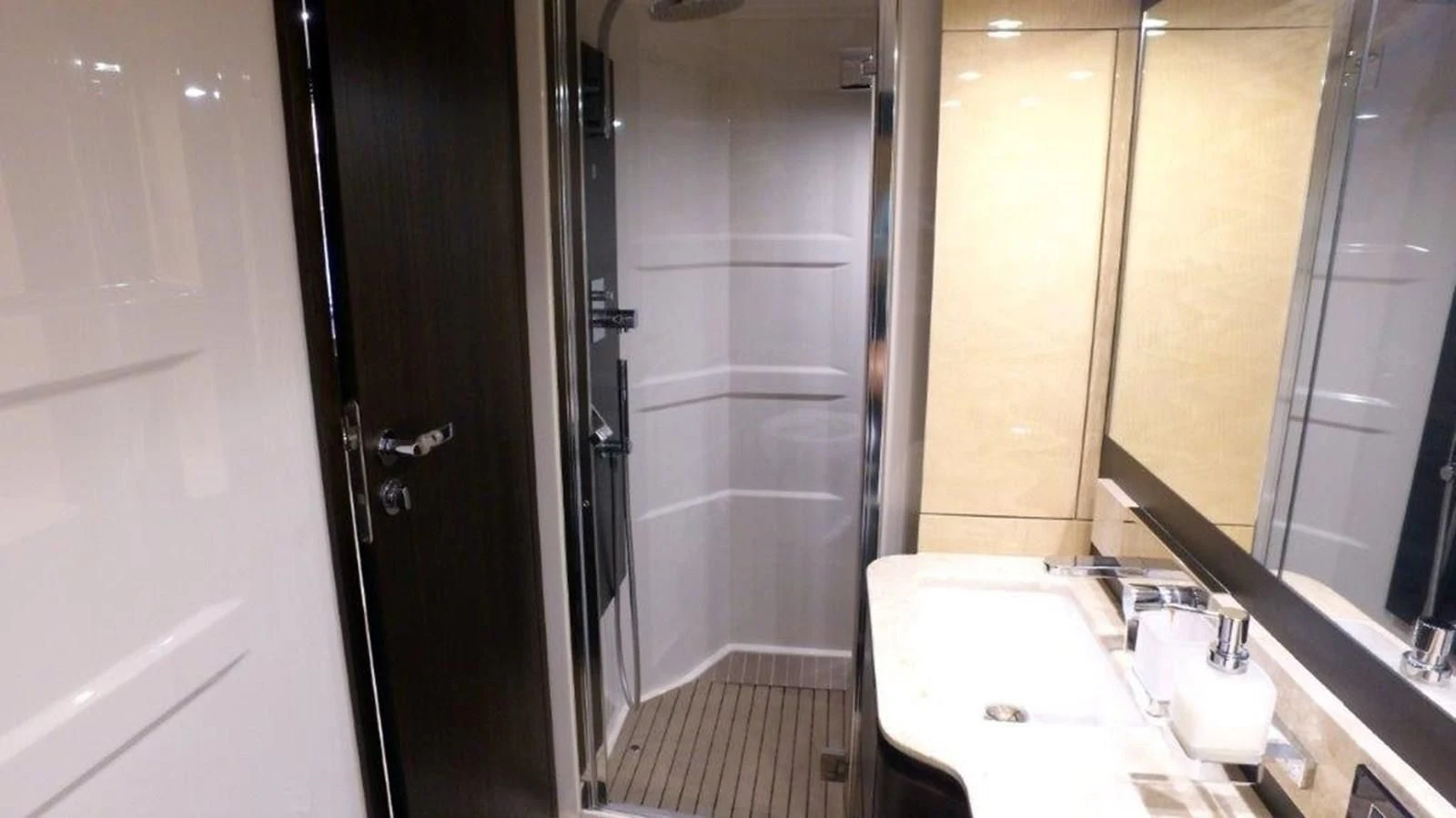 a bathroom with a sink and a shower aboard LEVATAR Yacht for Sale