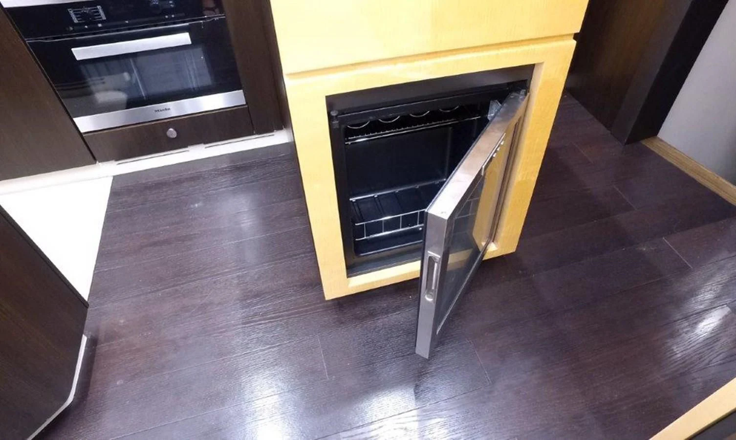 a kitchen with a stove and oven aboard LEVATAR Yacht for Sale