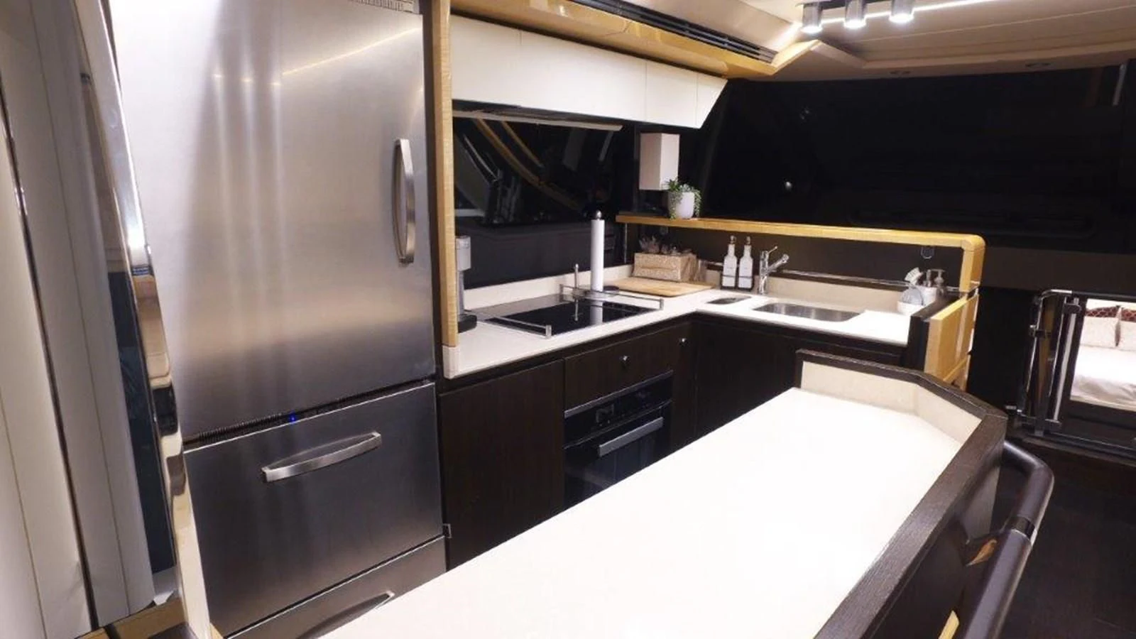 a kitchen with stainless steel appliances aboard LEVATAR Yacht for Sale