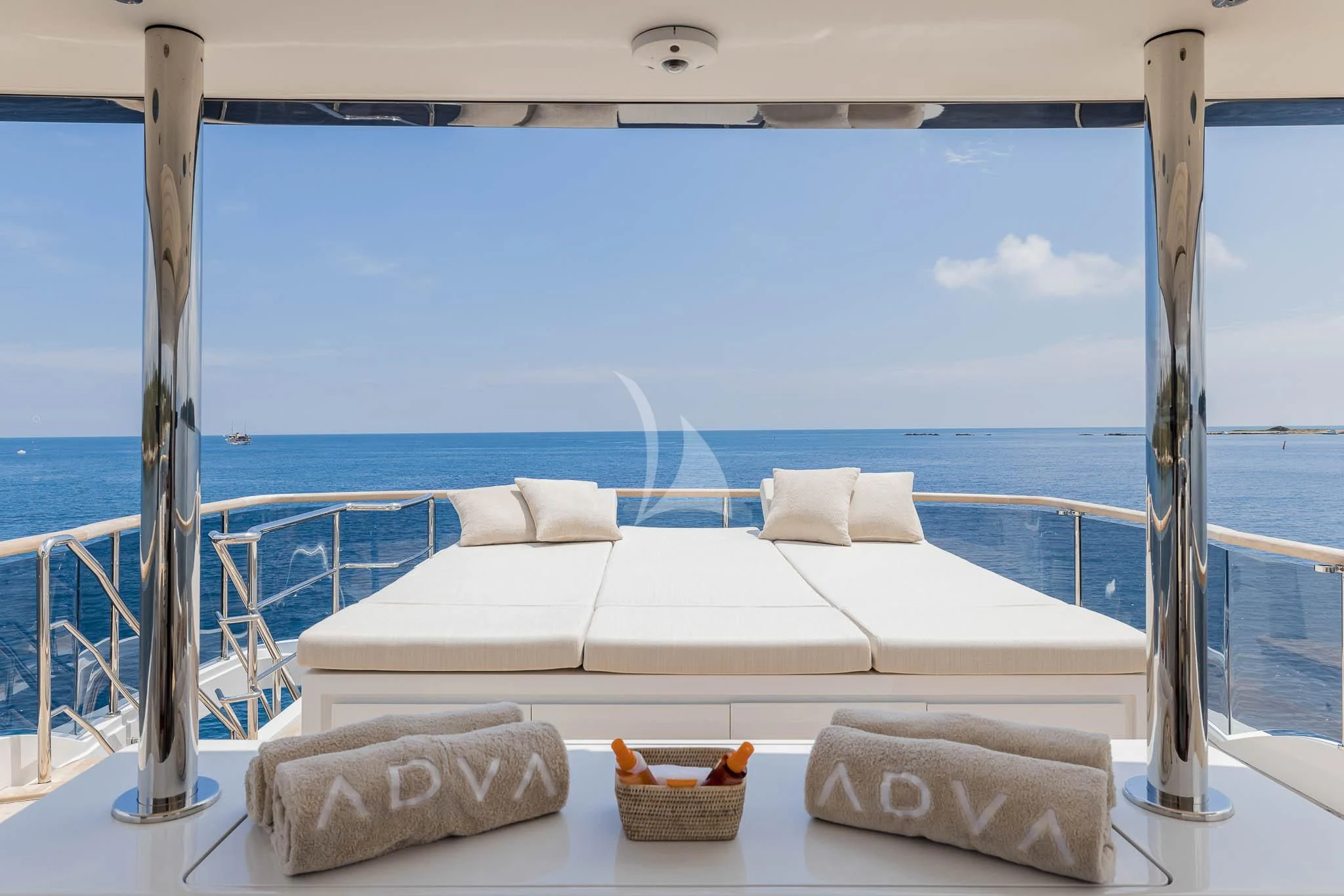a bed on a balcony aboard ADVA Yacht for Sale