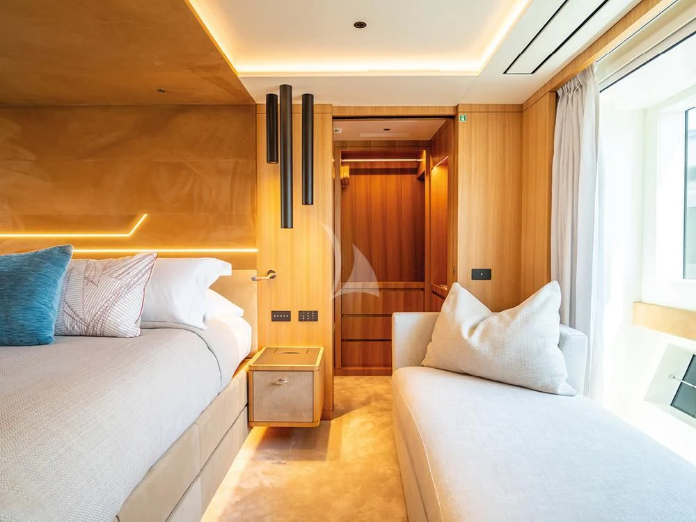 a room with two beds aboard ADVA Yacht for Sale