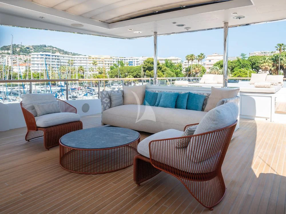 a living room with a large window aboard ADVA Yacht for Sale