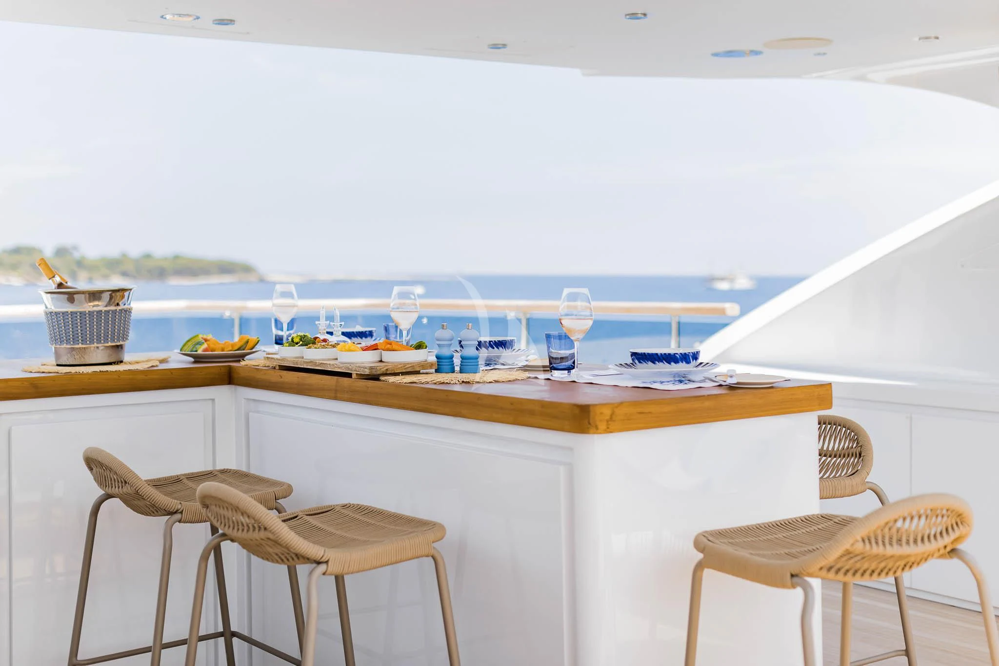 a table with chairs and a window aboard ADVA Yacht for Sale