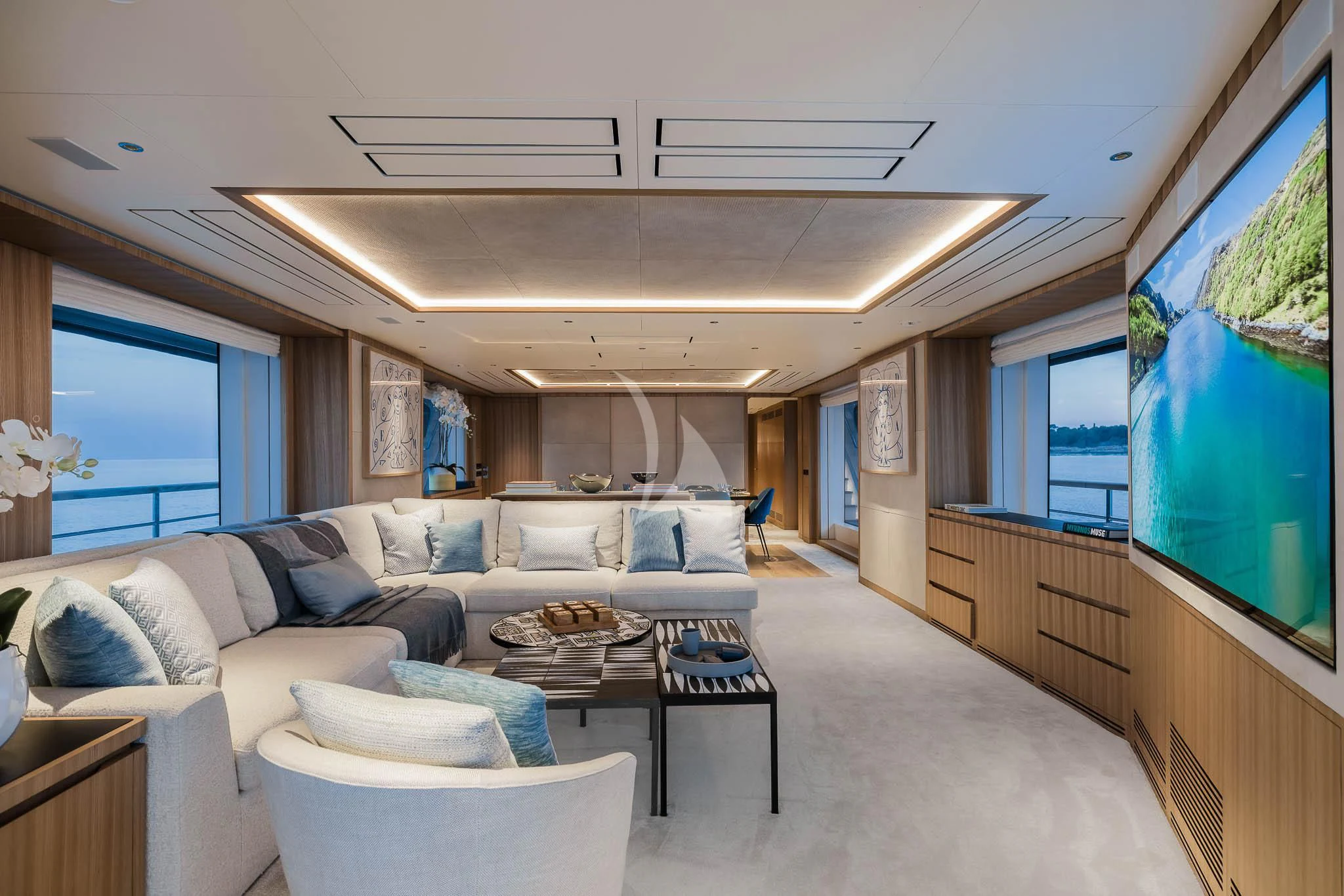 a living room with a large window aboard ADVA Yacht for Sale
