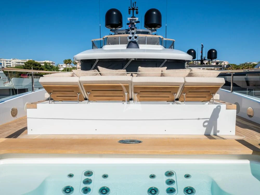 a white boat with a black top aboard ADVA Yacht for Sale