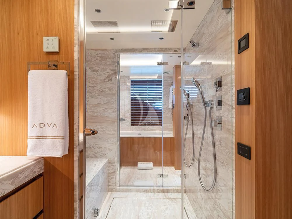 a shower unit in a bathroom aboard ADVA Yacht for Sale