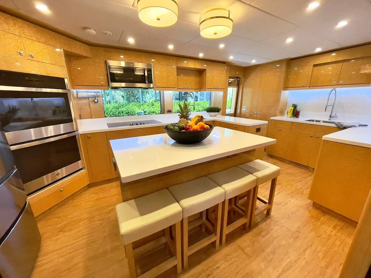 a kitchen with a large island aboard NEW BOAT WITH FULL WARRANTIES Yacht for Sale