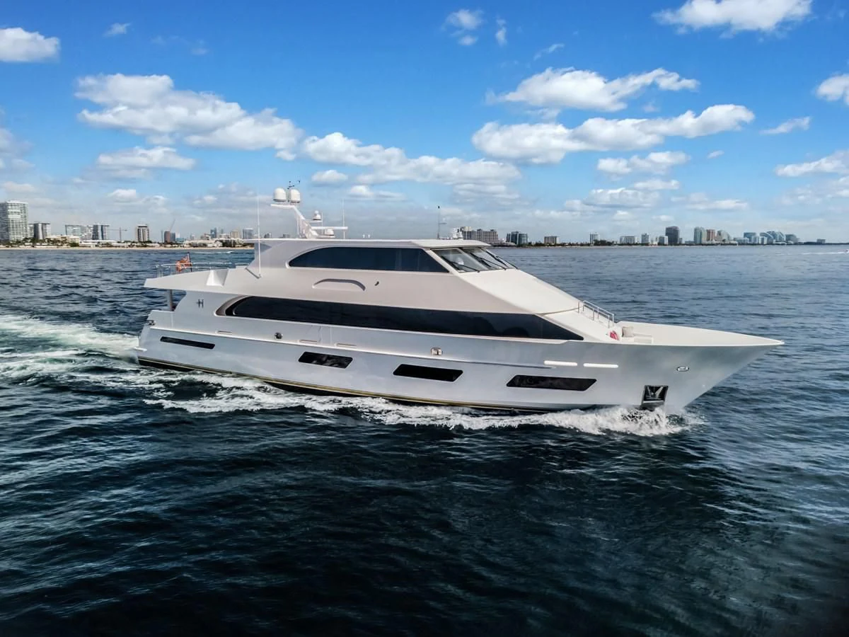 a white yacht on the water aboard NEW BOAT WITH FULL WARRANTIES Yacht for Sale