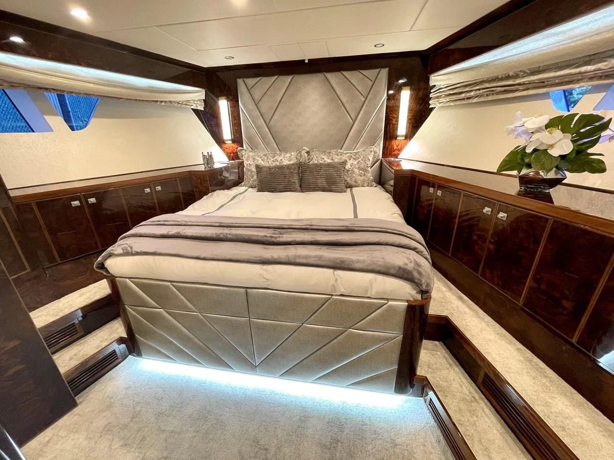a bed in a room aboard NEW BOAT WITH FULL WARRANTIES Yacht for Sale