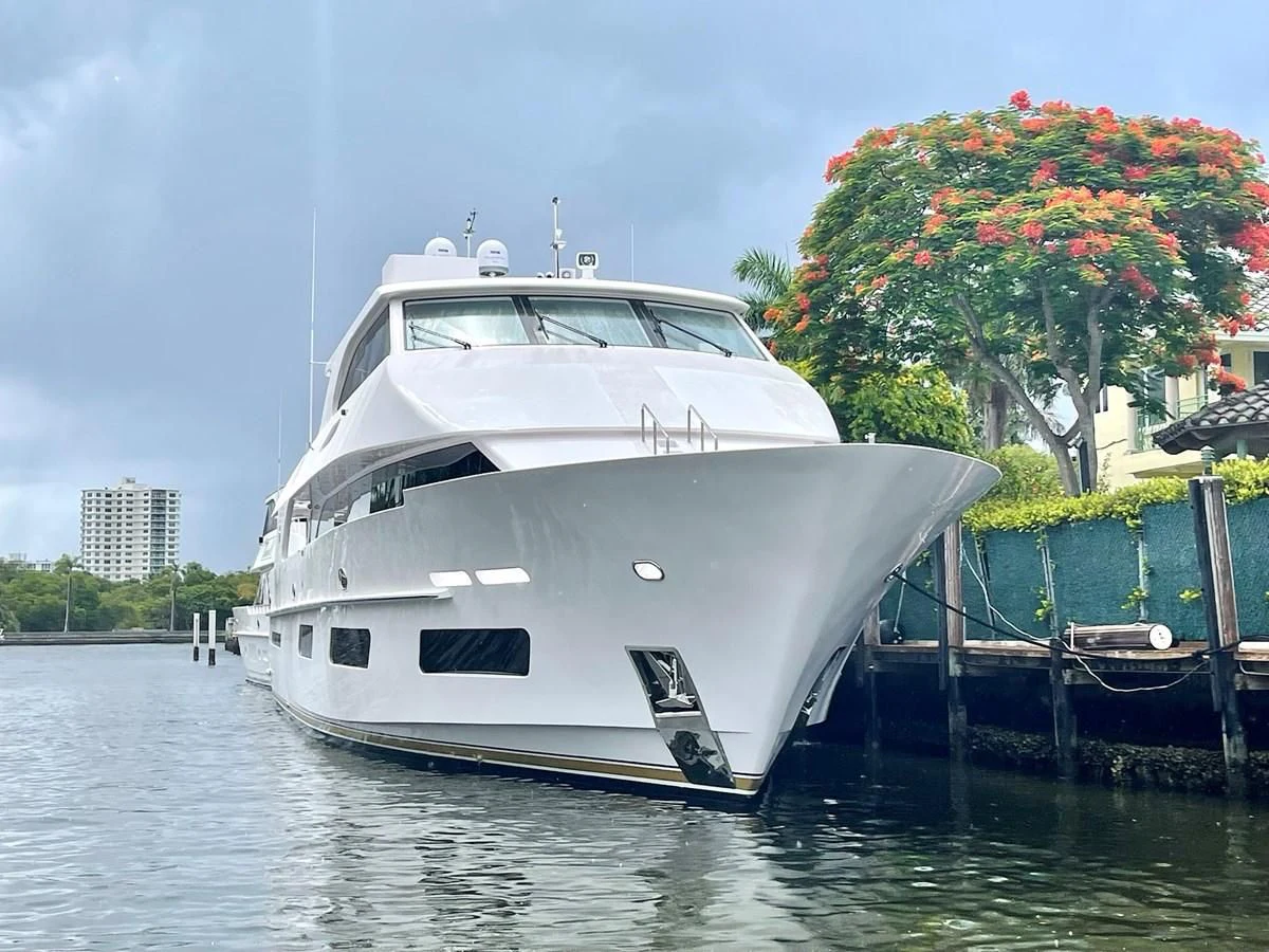 a white boat on water aboard NEW BOAT WITH FULL WARRANTIES Yacht for Sale