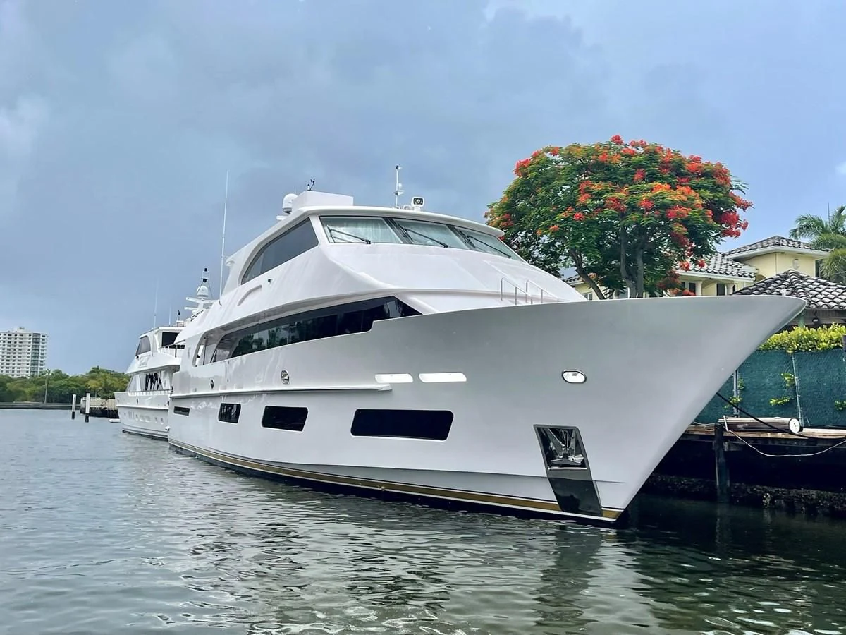 a white yacht on the water aboard NEW BOAT WITH FULL WARRANTIES Yacht for Sale