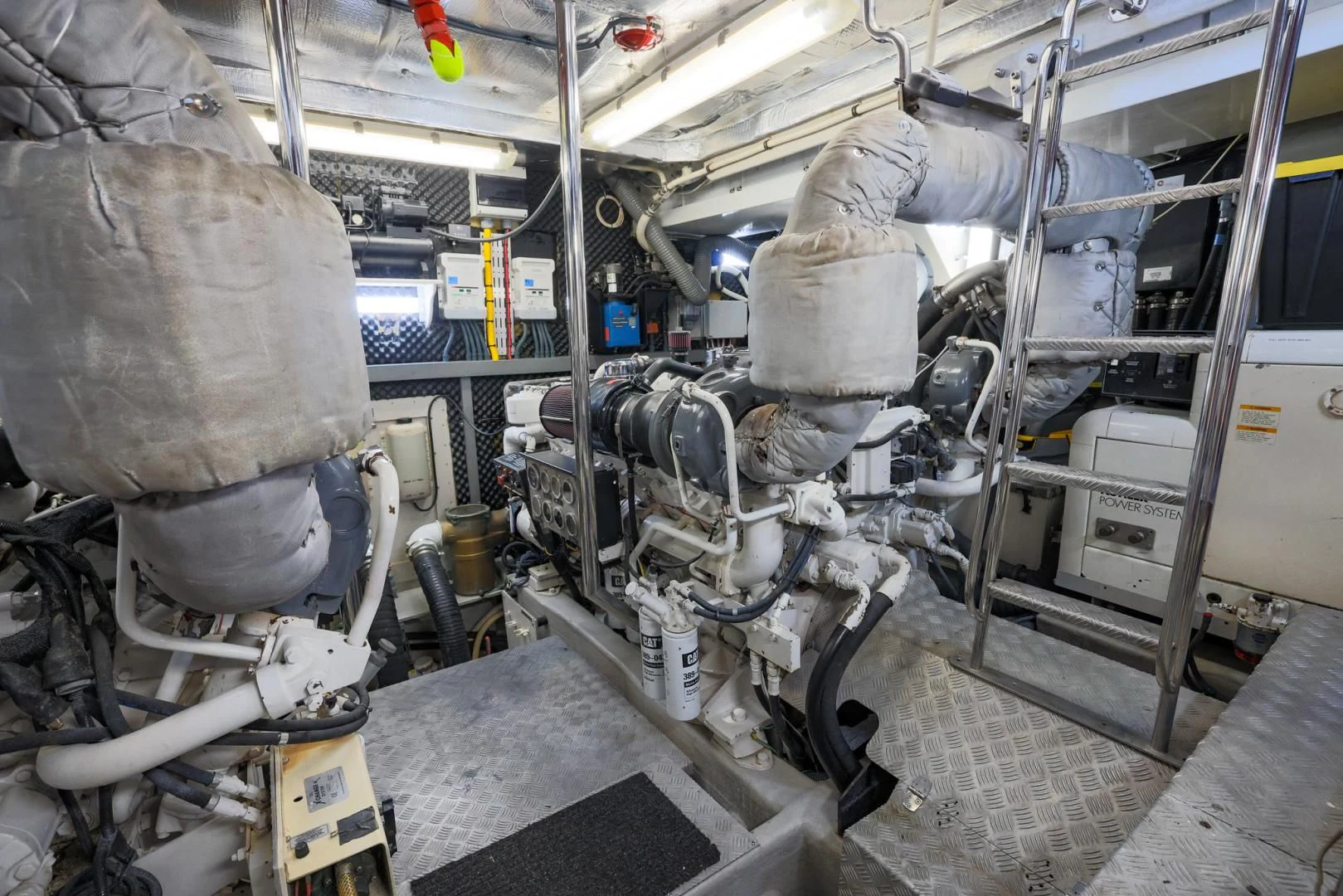 a large machine in a factory aboard SIROCCO Yacht for Sale