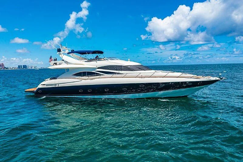 a white yacht in the water aboard SIROCCO Yacht for Sale