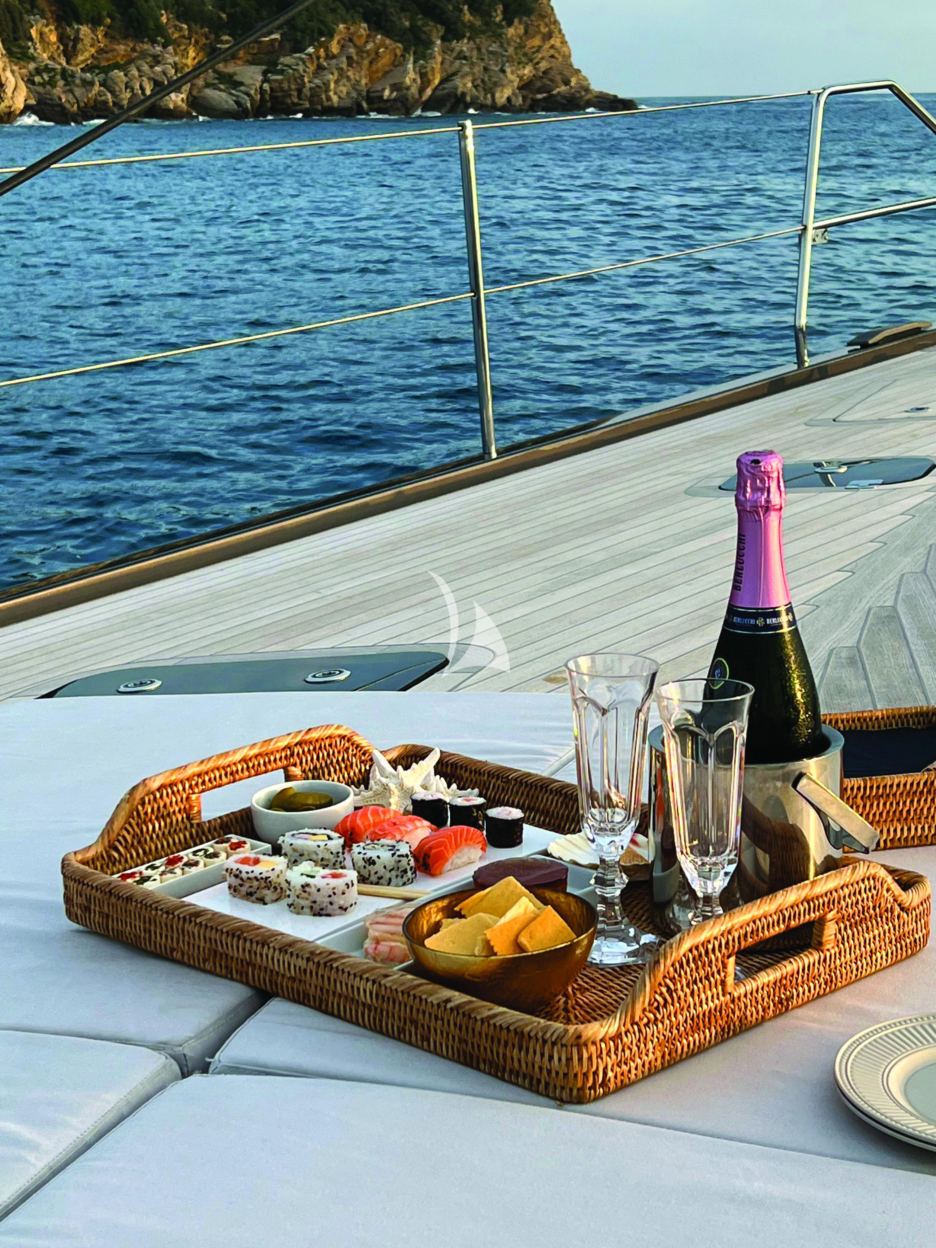 a tray of food on a boat aboard MINDFULNESS Yacht for Charter