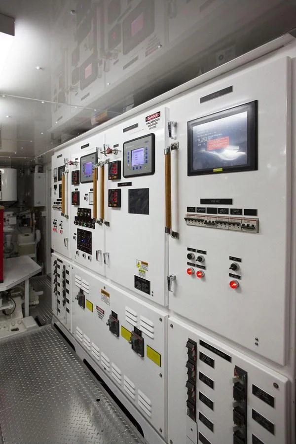 a control panel of a control room aboard DEFIANT Yacht for Sale