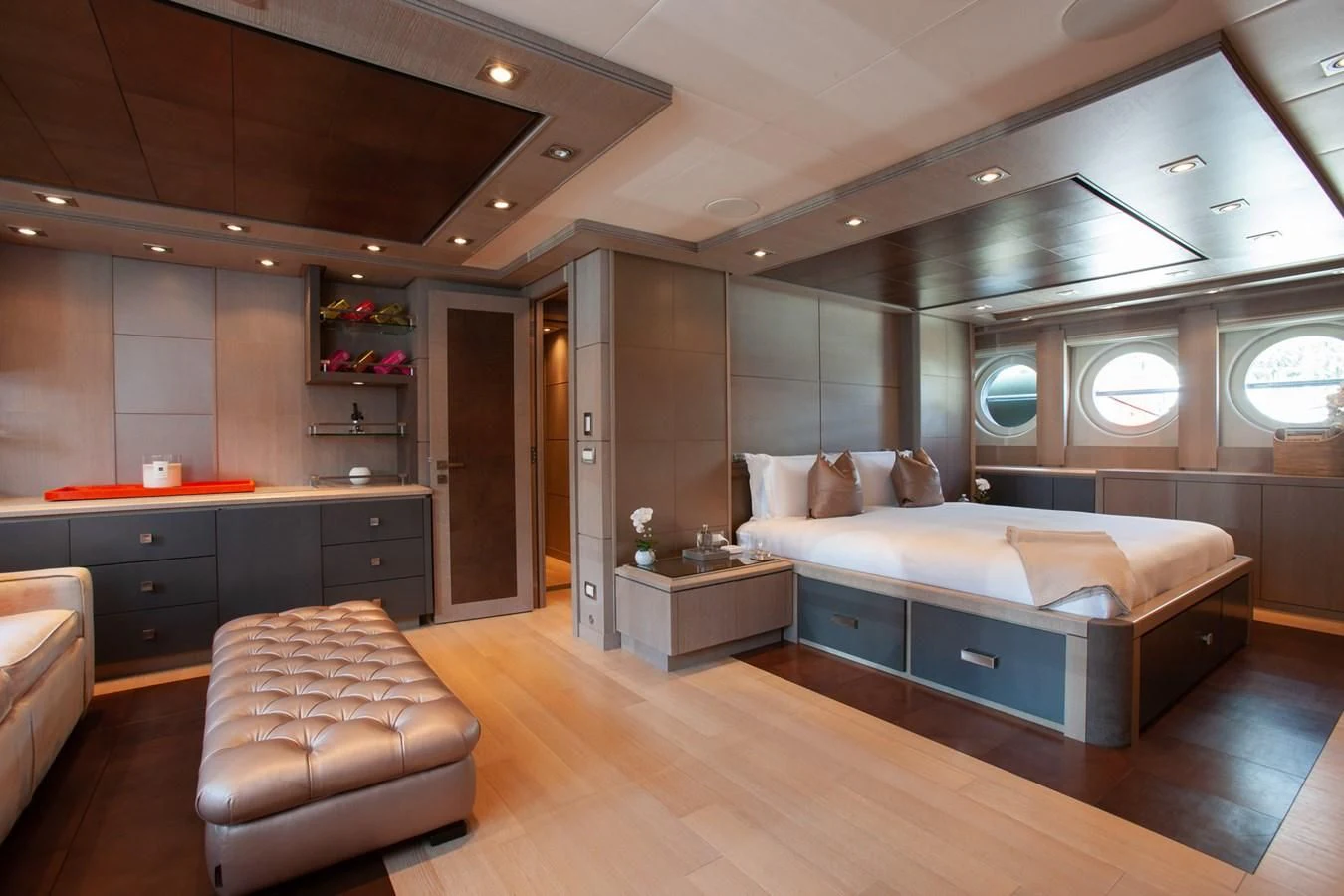 a room with a couch and a table aboard DEFIANT Yacht for Sale