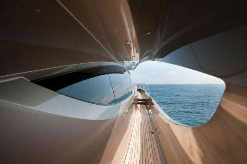 a close-up of a white car's hood aboard DEFIANT Yacht for Sale