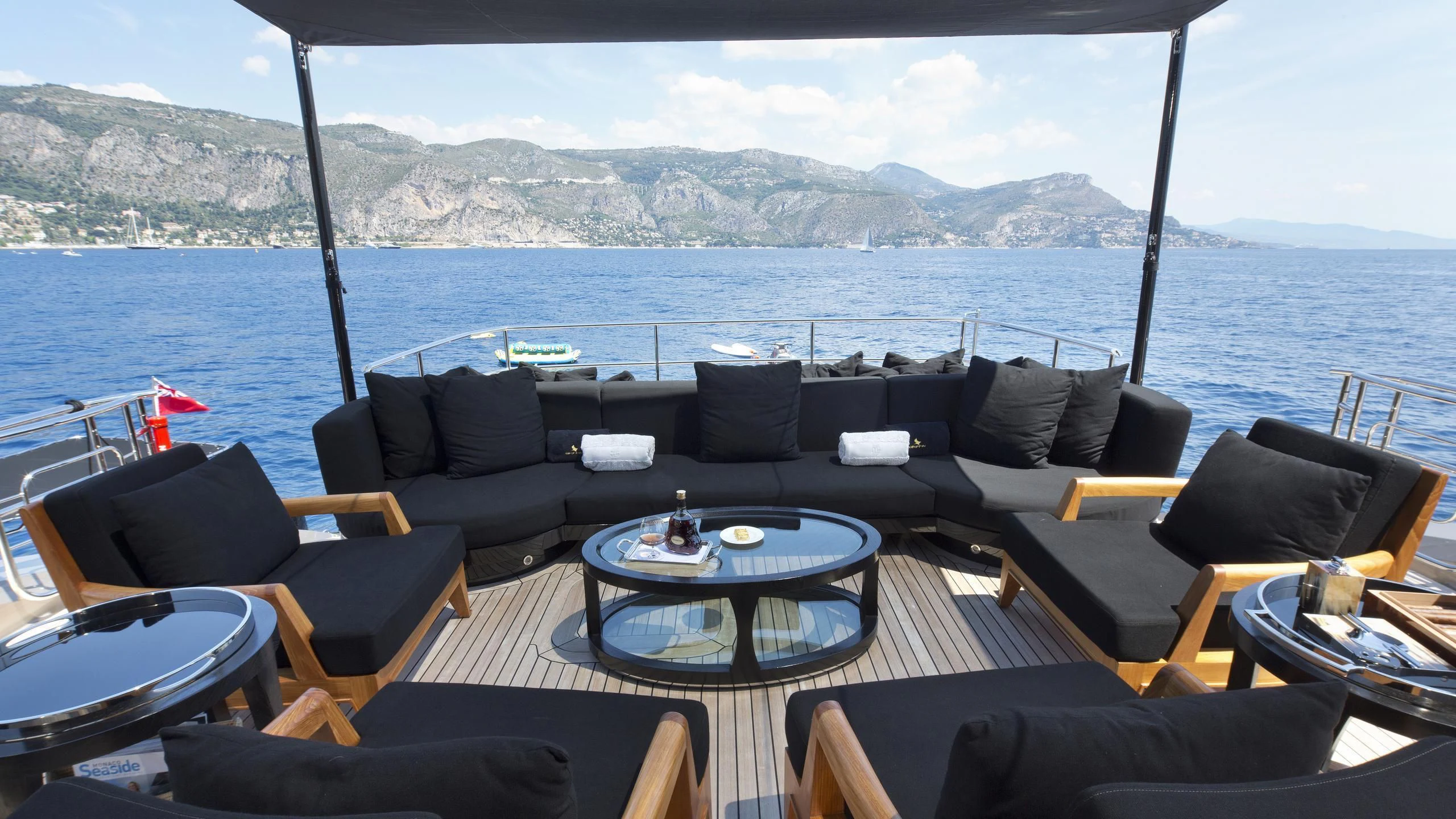 a large boat on the water aboard DEFIANT Yacht for Sale