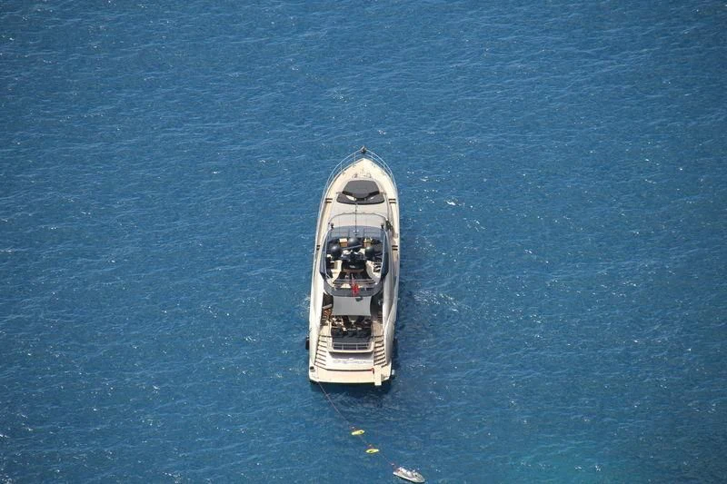 a boat in the water aboard DEFIANT Yacht for Sale