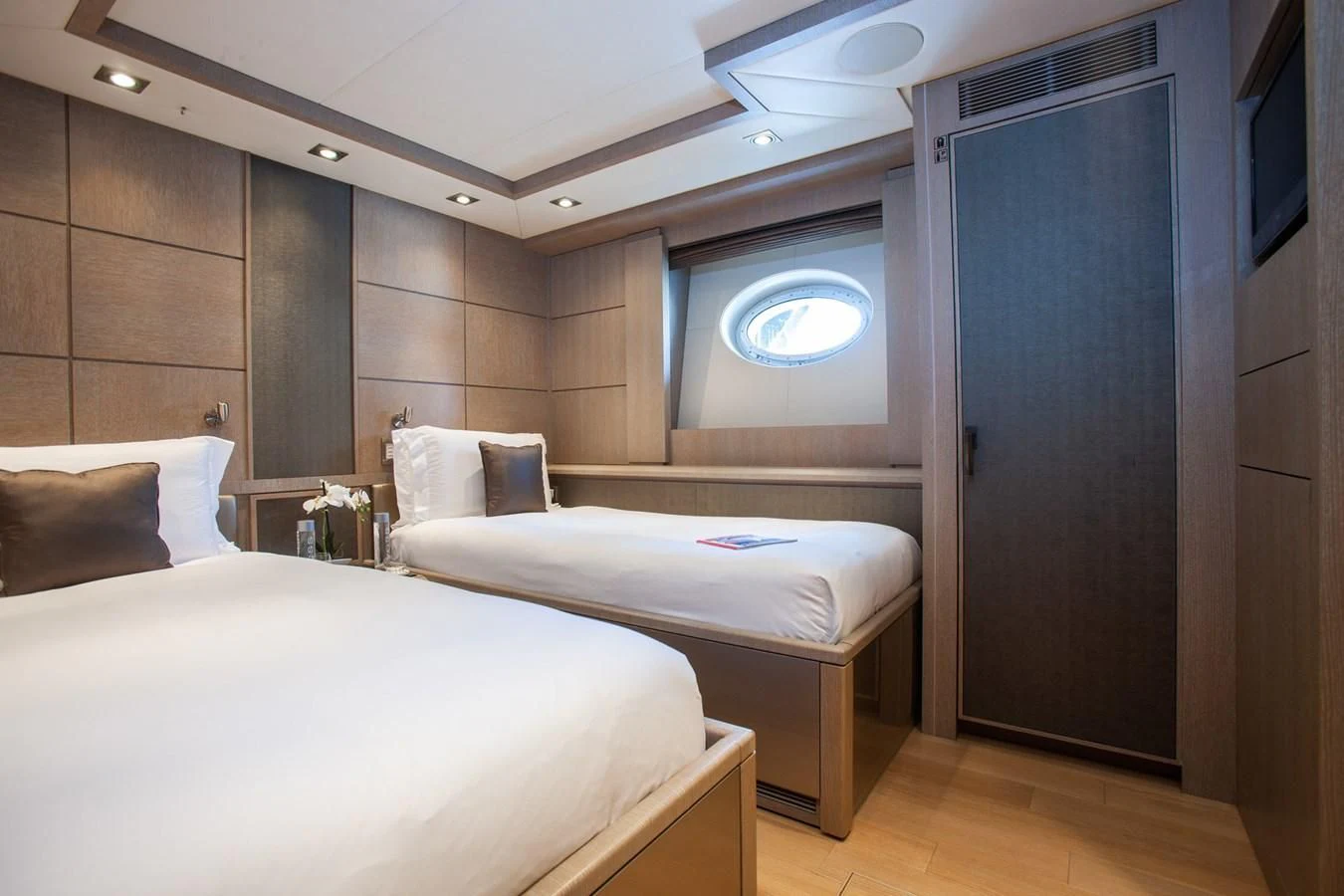 a room with two beds aboard DEFIANT Yacht for Sale