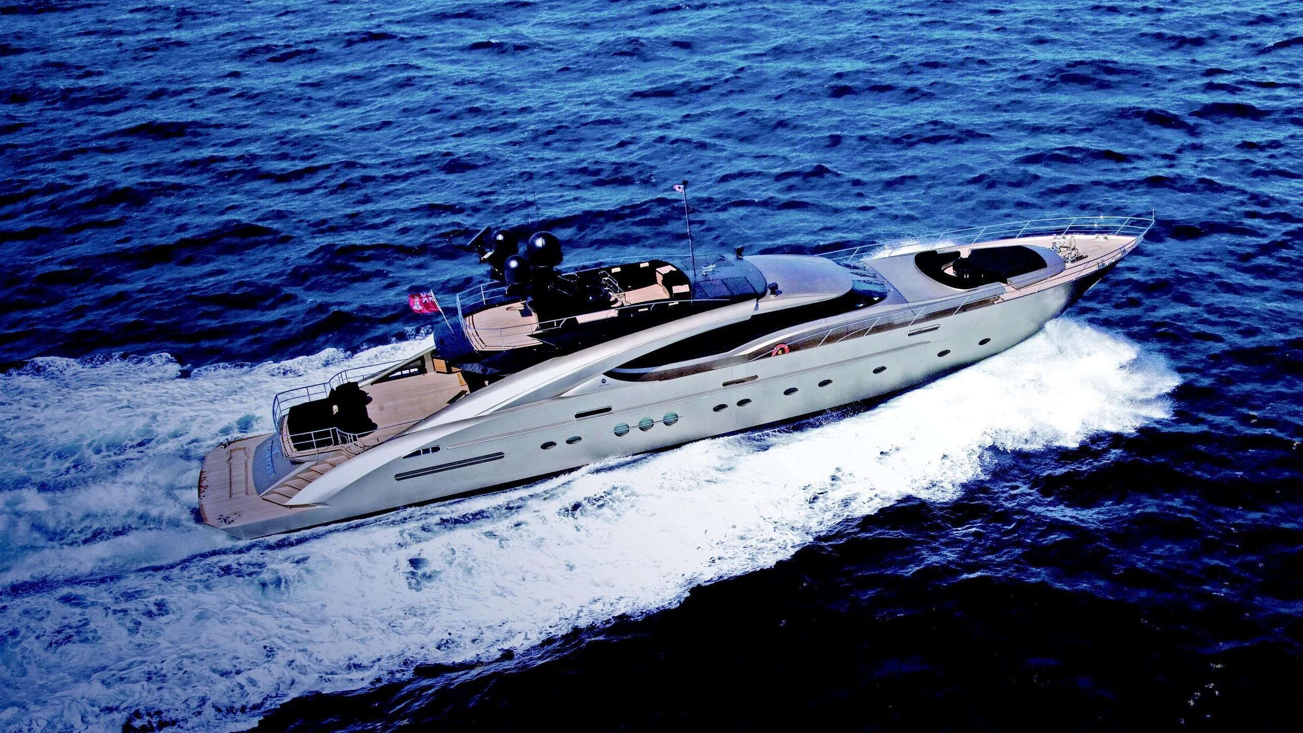 a white boat in the water aboard DEFIANT Yacht for Sale