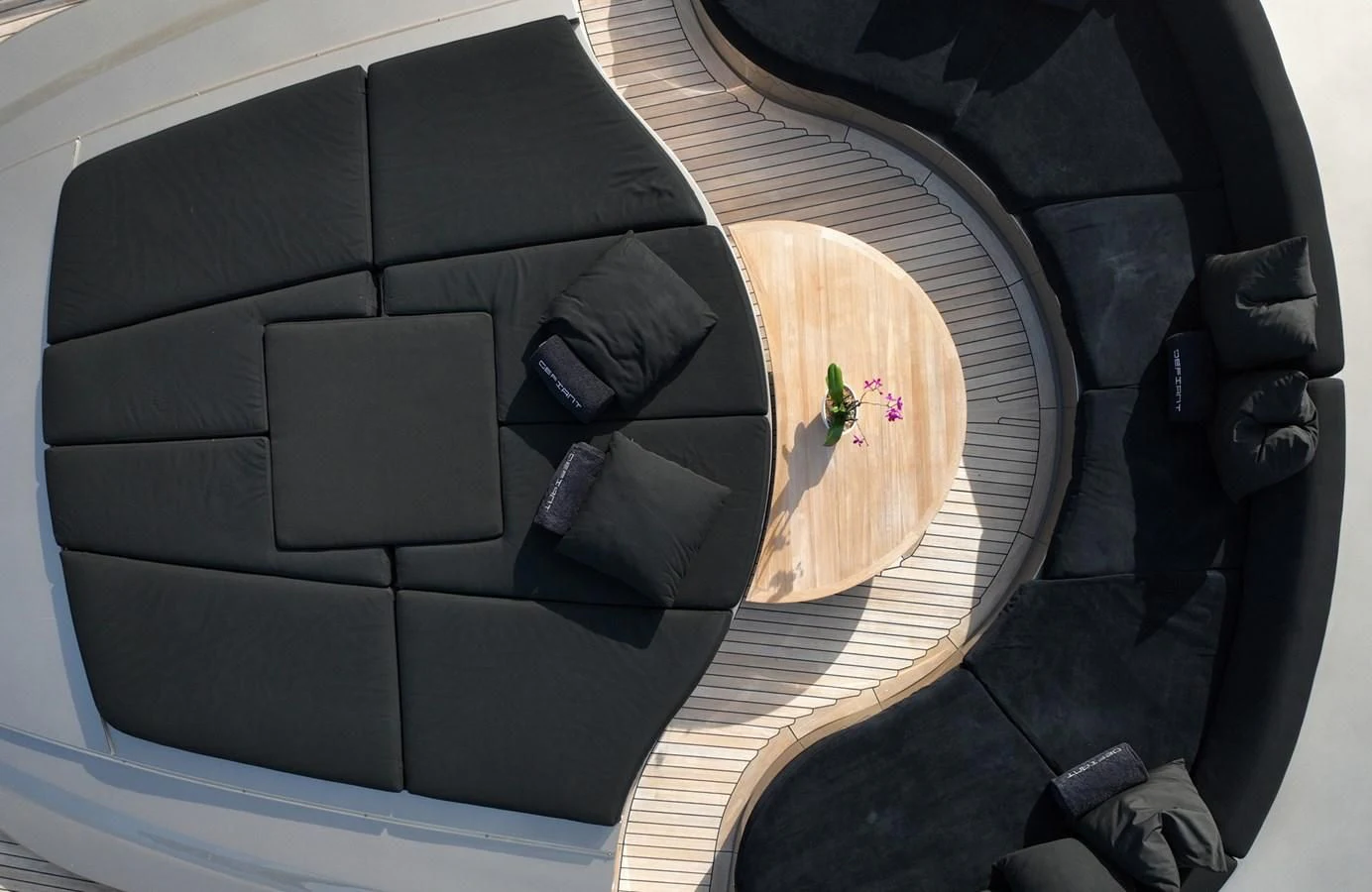 a black car with a flower on the side aboard DEFIANT Yacht for Sale