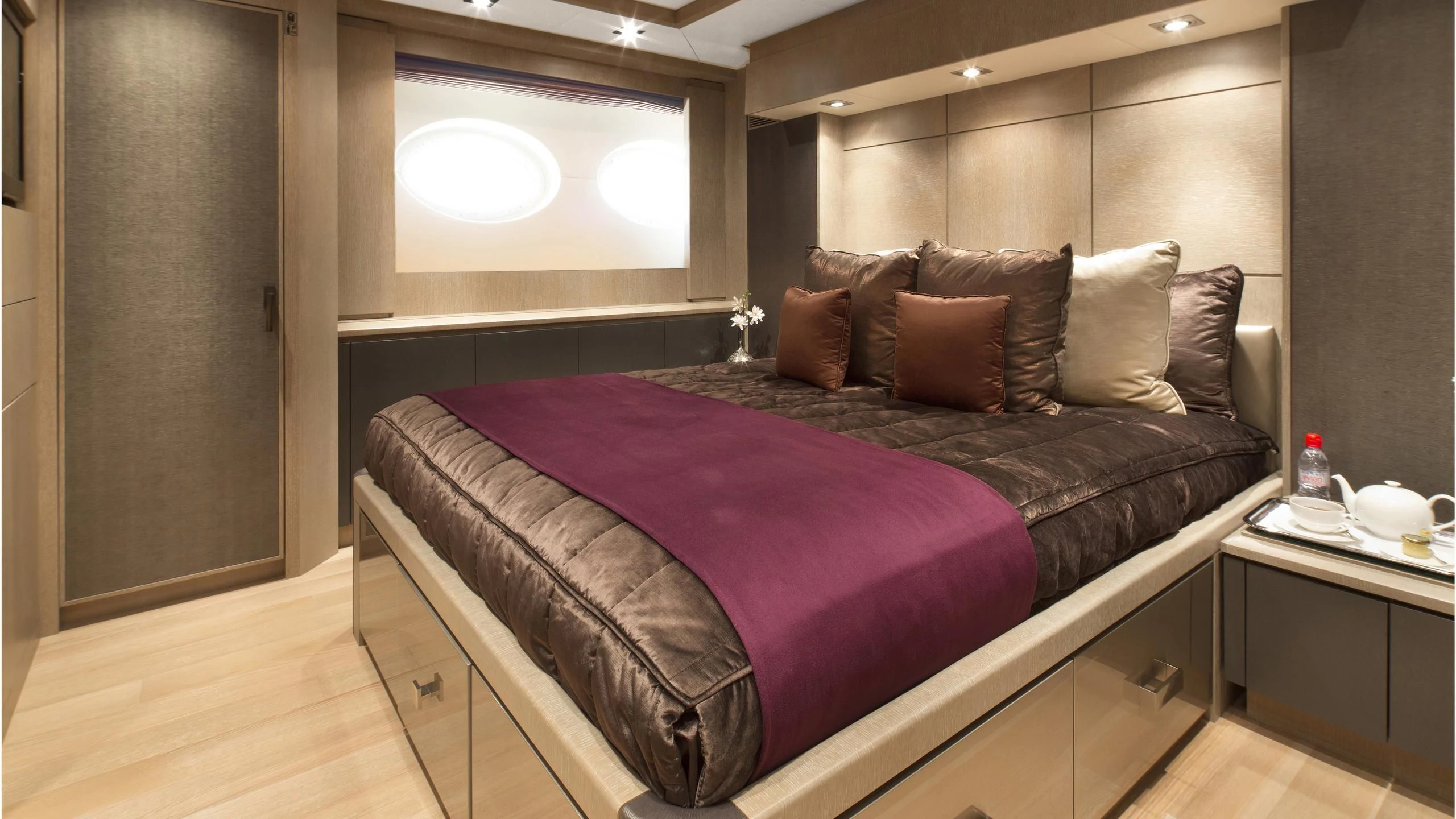 a bed with pillows aboard DEFIANT Yacht for Sale