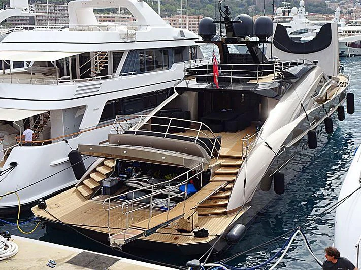 a boat docked at a pier aboard DEFIANT Yacht for Sale